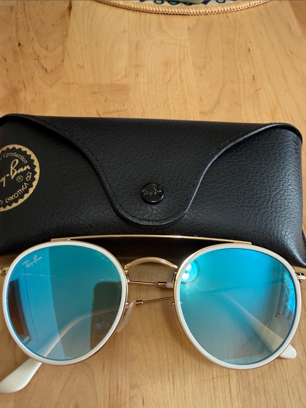 Ray-Ban Round Sunglasses with Blue Mirrored Lenses and White Frames